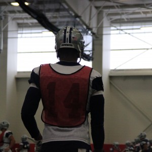 Dallas Cowboys practice squad member Rodney Smith prepares for Sunday's game along with the rest of the team at the Coppell High School fieldhosue on Friday. Practice was moved to CHS due to rainy weather conditions. Photo by Malorie Munoz.