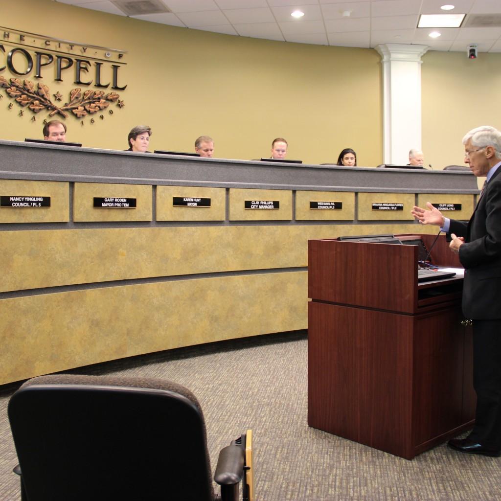 Vice president of the pipeline operations of ATMOS energy Jeff Hargrave proposes a gas pipeline exchange project to the Coppell city council on October 27 at Coppell City Hall. Hargrove warned the council of the danger tree roots pose to corroding the pipeline covering and possibly causing gas leakage. Photo by Jennifer Su.