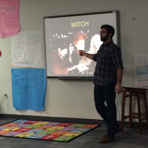 Longtime American Sign Language substitute Zach Kapulka has a Halloween lesson, showing the kids how to sign words such as “zombie” or “witch”. By communicating through his main language, sign language because he is deaf, he is a great teacher for the kids. Photo by Aubrie Sisk. 