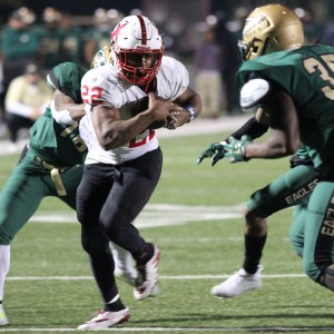 During the third quarter of Friday night's game, Coppell High School running back and senior Brandon Rice goes in for a touchdown against the DeSoto Eagles. The Eagles ended up defeating the Cowboys with a score of 35-31, finalizing Coppell's season. Photo by Amanda Hair.