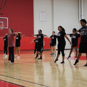 Coppell High School dance students learn their choreography for a jazz unit today during 5th period in the small gym. They plan to perform this dance later on this year in the spring show. 