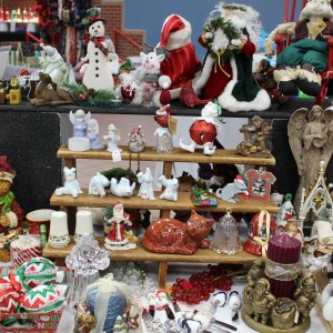 Vendors sell goods such as antique Christmas gifts at the 20th annual Holiday House put on by the CHS Project Graduation. The event took place in the CHS commons and hallways on Nov. 15. Photo by Kelly Monaghan.
