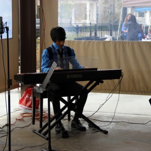 Coppell High School senior Chaitanya Srinivasan performs Waltz in A minor by Chopin on the piano at the Coppell Arts Festival on Oct. 31. “I have been playing the piano for twelve years,” Srinivasan said. “My favorite song is Fantasie-Impromptu by Chopin.” Photo by Ayoung Jo.