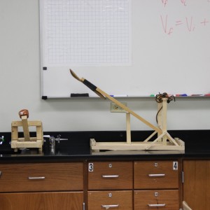 Karl Gscheidle’s physics class constructs catapults in order to test velocity and the distance that they cover. Trials took place Monday in the main hallway at Coppell High School. Photo By Chelsea Banks. 