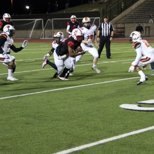 Coppell High School senior running back Brandon Rice runs the ball on offense during the second quarter. The Cowboys beat the Buffalos Friday night at Buddy Echols Field 44-6. Photo by Megan Winkle