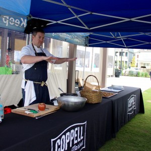 Chef Joe Baker prepares to make his french dish Tarte Tatin at the Coppell Wellness Day at the Coppell Farmers Market on Nov. 7. Baker has been previously featured on the Food Network and has worked in numerous prestigious restaurants across the United States. Photo by Jennifer Su.