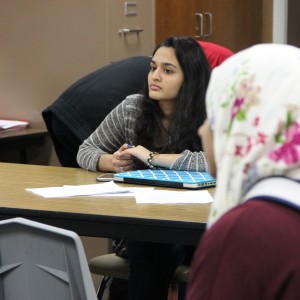 Coppell High School junior Swetha Venigandla listens to the information about upcoming projects of the Humanitarian Society during its meeting Tuesday after school. “I joined because the issue of Syrian refugees is very big right now,” said Venigandla, “I think that helping them would be a great experience”. Photo by Ayoung Jo.