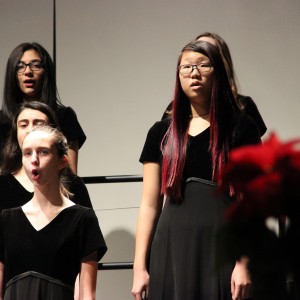  Members of the Coppell High School Bella Voche choir start off Tuesday night’s winter concert in the CHS auditorium. Both Christmas and non-holiday songs were performed. Photo by Amanda Hair.