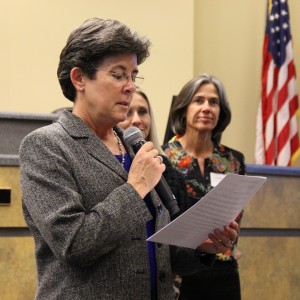 During tonight's City Council meeting, Coppell mayor Karen Hunt swears in new board members after listing their new responsibilities. After inducting new members, topics such as neighborhood zoning issues and school budgets were discussed. Photo by Amanda Hair. 