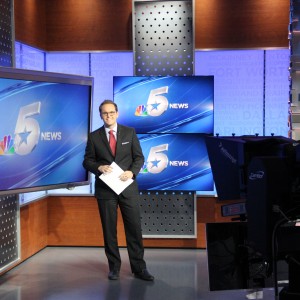 NBC 5 sports anchor Pat Doney broadcasts his report on the TCU game on Dec. 22 at NBC 5 studios. Doney has worked at NBC for three years. Photo by Mallorie Munoz.