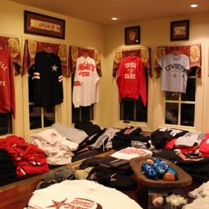 Coppell spiritwear from Spirit Round-Up is sold at Laura Swaldi’s annual holiday show on Dec. 8. The event was held at her house and holiday presents were available for purchase such as jewelry, men’s gifts, and snacks. Photo by Kelly Monaghan.