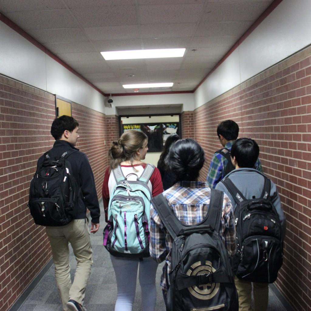 Members of the Coppell Music Chamber club walk to the band and choir halls to practice on Dec. 3. The members practice as a group for about an hour every week. Photo by Jennifer Su. 