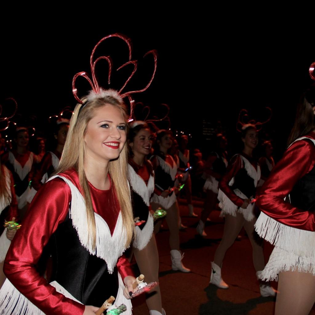 Coppell High School senior Brittan Bresnahan dances with the lariettes at the annual Coppell Holiday Parade on Dec. 5 at the Coppell Town Center plaza. The Coppell High School Lariettes drill team is an award winning drill team in the state of Texas. Photo by Jennifer Su.
