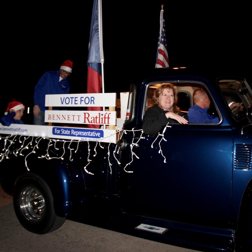 The Vote Bennett Ratliff float makes an appearance at the annual Coppell Holiday Parade on Dec. 5 at the Coppell Town Center plaza. Ratliff is a civil engineer and small business owner in Coppell, Texas, served as a Republican member of the Texas House of Representatives, and is now running for State Representative for the Northwest Dallas County. Photo by Jennifer Su.