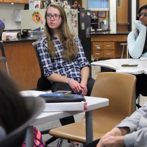 Coppell High School junior Colleen Jones suggests a creative name idea for a clothing drive at the Leo club meeting Wednesday afterschool in room E203. Jones will be in charge of designing posters for upcoming events of the club. Photo by Ayoung Jo.